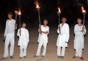 Torch bearing boys at Samode